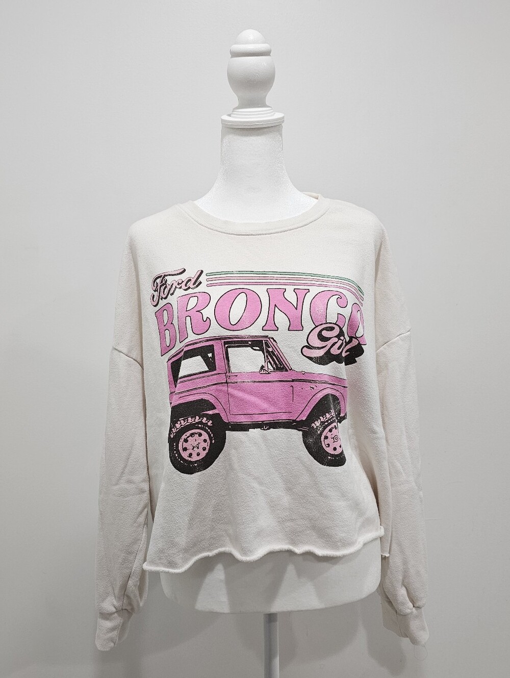 Ford Cream Sweatshirt with Pink Bronco Graphic